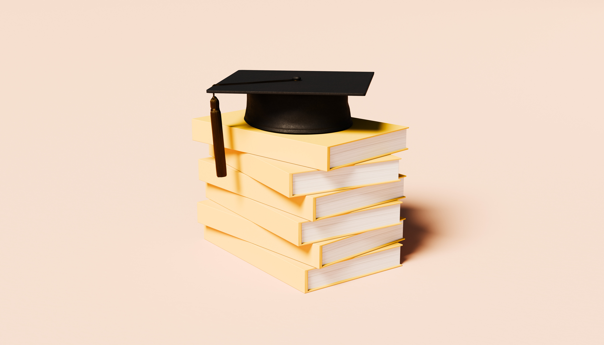 Stack of Blank Yellow Books Topped with Graduation Cap – Knowledge and Academic Achievement Concept